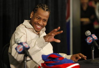 AUBURN HILLS, MI - NOVEMBER 04:  Allen Iverson #1 of the Detroit Pistons waves to one of his children prior to a press conference after being traded from the Denver Nuggets on November 4, 2008 at the Palace of Auburn Hills in Auburn Hills, Michigan. NOTE TO USER: User expressly acknowledges and agrees that, by downloading and or using this photograph, User is consenting to the terms and conditions of the Getty Images License Agreement.  (Photo by Gregory Shamus/Getty Images)