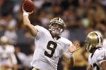 NEW ORLEANS - AUGUST 14:  Quarterback Drew Brees #9 of the New Orleans Saints throws a touchdown pass to tight end Jeremy Shockey (not pictured) during a preseason game against the Cincinnati Bengals on August 14, 2009 at the Superdome in New Orleans, Louisiana. (Photo by Chris Graythen/Getty Images)