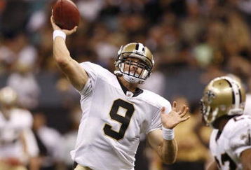 NEW ORLEANS - AUGUST 14:  Quarterback Drew Brees #9 of the New Orleans Saints throws a touchdown pass to tight end Jeremy Shockey (not pictured) during a preseason game against the Cincinnati Bengals on August 14, 2009 at the Superdome in New Orleans, Louisiana. (Photo by Chris Graythen/Getty Images)