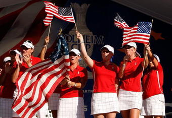 SUGAR GROVE, IL - AUGUST 23:  Members of the U.S. Team celebrate during the closing ceremonies for the 2009 Solheim Cup at Rich Harvest Farms on August 23, 2009 in Sugar Grove, Illinois.  (Photo by Chris Graythen/Getty Images)