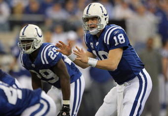 INDIANAPOLIS - JANUARY 13:  Peyton Manning #18 of the Indianapolis Colts calls signals out of the shotgun formation next to Joseph Addai #29 against the San Diego Chargers during their AFC Divisional Playoff game at the RCA Dome on January 13, 2008 in Indianapolis, Indiana. The Chargers won 28-24. (Photo by Doug Pensinger/Getty Images)