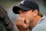 DENVER - JULY 09:  Starting pitcher Derek Lowe #2 of the Atlanta Braves looks on from the dugout on the eve of his start against the Colorado Rockies during MLB action at Coors Field on July 9, 2009 in Denver, Colorado. The Rockies defeated the Braves 7-6.  (Photo by Doug Pensinger/Getty Images)
