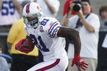 CANTON, OH - AUGUST 9: Terrell Owens #81 of the Buffalo Bills runs with the football against the Tennessee Titans during the Pro Football Hall of Fame Game at Fawcett Stadium on August 9, 2009 in Canton, Ohio. (Photo by Joe Robbins/Getty Images)