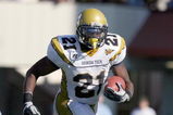 CHAPEL HILL, NC - NOVEMBER 08:  Jonathan Dwyer #21 of the Georgia Tech Yellow Jackets carries the ball during the game against the North Carolina Tar Heels at Kenan Stadium on November 8, 2008 in Chapel Hill, North Carolina.  (Photo by Kevin C. Cox/Getty Images)
