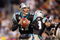 CHARLOTTE, NC - DECEMBER 14:  Quarterback Jake Delhomme #17 of the Carolina Panthers looks to pass the ball during the game against the Denver Broncos at Bank of America Stadium on December 14, 2008 in Charlotte, North Carolina. (Photo by: Streeter Lecka/Getty Images)