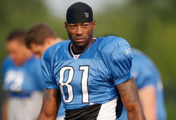 ALLEN PARK, MI - AUGUST 04:  Calvin Johnson #81 of the Detroit Lions looks on during training camp at the Detroit Lions Headquarters and Training Facility on August 4, 2009 in Allen Park, Michigan.  (Photo by Gregory Shamus/Getty Images)