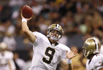NEW ORLEANS - AUGUST 14:  Quarterback Drew Brees #9 of the New Orleans Saints throws a touchdown pass to tight end Jeremy Shockey (not pictured) during a preseason game against the Cincinnati Bengals on August 14, 2009 at the Superdome in New Orleans, Louisiana. (Photo by Chris Graythen/Getty Images)