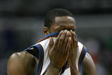WASHINGTON  - APRIL 28:  Gilbert Arenas #00 of the Washington Wizards reacts during the second half of game three of the Eastern Conference Quarterfinals against the Cleveland Cavaliers during the 2006 NBA Playoffs at the Verizon Center on April 28, 2006 in Washington, DC. NOTE TO USER: User expressly acknowledges and agrees that, by downloading and/or using this Photograph, user is consenting to the terms and conditions of the Getty Images License Agreement.  (Photo by Jamie Squire/Getty Images)