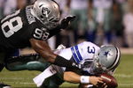 OAKLAND, CA - AUGUST 13: Defensive end Jay Richardson #98 of the Oakland Raiders sacks quarterback Jon Kitna #3 of the Dallas Cowboys after a bad snap during the preseason game at Oakland-Alameda County Coliseum on August 13, 2009 in Oakland, California. (Photo by Jed Jacobsohn/Getty Images)