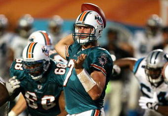 MIAMI - AUGUST 22:  Quarterback Chad Henne #7 of the Miami Dolphins throws a pass against the Carolina Panthers during a pre-season game at Land Shark Stadium on August 22, 2009 in Miami, Florida. The Dolphins defeated the Panthers 27-17.  (Photo by Doug Benc/Getty Images)