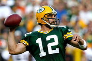 GREEN BAY, WI - AUGUST 15:  Quarterback Aaron Rodgers #12 of the Green Bay Packers passes the ball in the first quarter against the Cleveland Browns during the preseason game at Lambeau Field on August 15, 2009 in Green Bay, Wisconsin. (Photo by Jonathan Daniel/Getty Images)