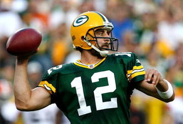 GREEN BAY, WI - AUGUST 15:  Quarterback Aaron Rodgers #12 of the Green Bay Packers passes the ball in the first quarter against the Cleveland Browns during the preseason game at Lambeau Field on August 15, 2009 in Green Bay, Wisconsin. (Photo by Jonathan Daniel/Getty Images)