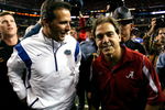 ATLANTA - DECEMBER 06:  Head coach Nick Saban of the Alabama Crimson Tide congratulates head coach Urban Meyer of the Florida Gators after the Gators 31-20 win in the SEC Championship on December 6, 2008 at the Georgia Dome in Atlanta, Georgia.  (Photo by Kevin C. Cox/Getty Images)