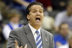 KANSAS CITY, MO - MARCH 19:  Head Coach John Calipari of the Memphis Tigers yells during their  first round game against the CSUN Matadors in the first half of the NCAA Division I Men's Basketball Tournament at the Sprint Center on March 19, 2009 in Kansas City, Missouri.  (Photo by Jamie Squire/Getty Images)
