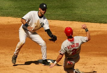 NEW YORK - AUGUST 13:  Derek Jeter #2 of the New York Yankees tags out Adam Kennedy #2 of the Los Angeles Angels of Anaheim at second August 13, 2006 at Yankee Stadium in the Bronx borough of New York City.  (Photo by Nick Laham/Getty Images)