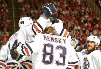 RALEIGH, NC - JUNE 14:  Ales Hemsky #24 of the Edmonton Oilers and teammates celebrate Hemsky scoring the second goal during the first period of game five of the 2006 NHL Stanley Cup Finals against the Carolina Hurricanes on June 14, 2006 at the RBC Center in Raleigh, North Carolina.  (Photo by Elsa/Getty Images)
