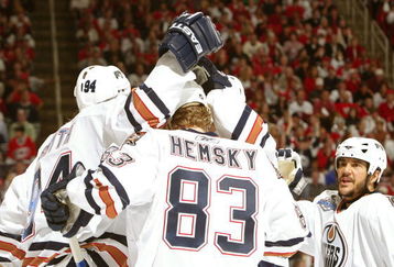 RALEIGH, NC - JUNE 14:  Ales Hemsky #24 of the Edmonton Oilers and teammates celebrate Hemsky scoring the second goal during the first period of game five of the 2006 NHL Stanley Cup Finals against the Carolina Hurricanes on June 14, 2006 at the RBC Center in Raleigh, North Carolina.  (Photo by Elsa/Getty Images)