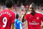 LONDON, ENGLAND - AUGUST 22:  Abou Diaby of Arsenal celebrates his goal with teammate Eduardo during the Barclays Premier League match between Arsenal and Portsmouth at the Emirates Stadium on August 22, 2009 in London, England.  (Photo by Mike Hewitt/Getty Images)