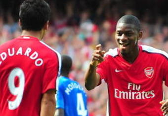 LONDON, ENGLAND - AUGUST 22:  Abou Diaby of Arsenal celebrates his goal with teammate Eduardo during the Barclays Premier League match between Arsenal and Portsmouth at the Emirates Stadium on August 22, 2009 in London, England.  (Photo by Mike Hewitt/Getty Images)