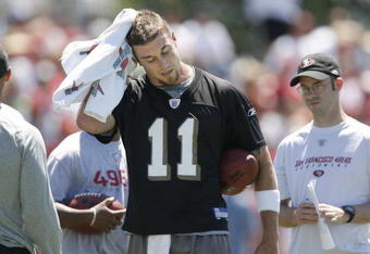 SANTA CLARA, CA - JULY 29:  Quarterback Alex Smith #11 of the San Francisco 49ers takes a break during training camp on July 29, 2007 in Santa Clara, California. (Photo by Greg Trott/Getty Images) 