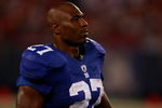NEW JERSEY - AUGUST 17:  Brandon Jacobs #27 of the New York Giants walks off the field at halftime during preseason NFL action against the Carolina Panthers at Giants Stadium August 17, 2009 at Giants Stadium in East Rutherford, New Jersey. (Photo by Jared Wickerham/Getty Images)