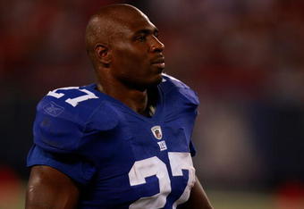 NEW JERSEY - AUGUST 17:  Brandon Jacobs #27 of the New York Giants walks off the field at halftime during preseason NFL action against the Carolina Panthers at Giants Stadium August 17, 2009 at Giants Stadium in East Rutherford, New Jersey. (Photo by Jared Wickerham/Getty Images)