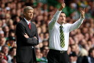 GLASGOW, SCOTLAND - AUGUST 18: Arsene Wenger manager of Arsenal with Tony Mowbury Manager of Celtic during a UEFA Champions League Qualifying match between Celtic and Arsenal at Celtic Park on August 18, 2009 in Glasgow, Scotland. (Photo by Phil Cole/Getty Images)