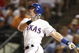 ARLINGTON, TX - JULY 20:  Michael Young #10 of the Texas Rangers watches his solo home run in the sixth inning to tie the Boston Red Sox 2-2 at Rangers Ballpark in Arlington on July 20, 2009 in Arlington, Texas. (Photo by Ronald Martinez/Getty Images)