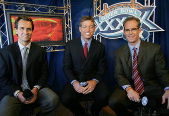 JACKSONVILLE, FL - FEBRUARY 6:  (L-R) FOX game broadcasters Cris Collinsworth, Troy Aiken and Joe Buck during the XXXIX Superbowl pregame show at Alltel Stadium on February 6, 2005 in Jacksonville, Florida.  (Photo by Frank Micelotta/Getty Images)