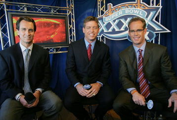 JACKSONVILLE, FL - FEBRUARY 6:  (L-R) FOX game broadcasters Cris Collinsworth, Troy Aiken and Joe Buck during the XXXIX Superbowl pregame show at Alltel Stadium on February 6, 2005 in Jacksonville, Florida.  (Photo by Frank Micelotta/Getty Images)