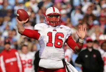 CHAPEL HILL, NC - NOVEMBER 22:  Russell Wilson #16 of the North Carolina State Wolfpack drops back to throw a pass against the North Carolina Tar Heels at Kenan Stadium on November 22, 2008 in Chapel Hill, North Carolina.  (Photo by Streeter Lecka/Getty Images)