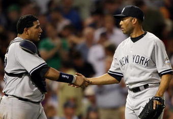 BOSTON - AUGUST 23: Mariano Rivera #42 and Jose Molina #26 of the New York Yankees celebrate the win over the Boston Red Sox on August 23, 2009 at Fenway Park in Boston, Massachusetts. The Yankees defeated the Red Sox 8-4.  (Photo by Elsa/Getty Images)