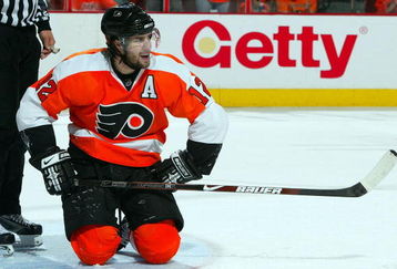 PHILADELPHIA - APRIL 25: Simon Gagne #12 of the Philadelphia Flyers looks on against the Pittsburgh Penguins during Game Six of the Eastern Conference Quarterfinal Round of the 2009 NHL Stanley Cup Playoffs at the Wachovia Center on April 25, 2009 in Philadelphia, Pennsylvania. (Photo by Jim McIsaac/Getty Images)