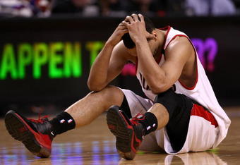 PORTLAND, OR - APRIL 18:  Brandon Roy #7 of the Portland Trail Blazers holds his head after being injured during a scramble for the ball against  the Houston Rockets during Game One of the Western Conference Quarterfinals of the 2009 NBA Playoffs on April 18, 2009 at the Rose Garden in Portland, Oregon. NOTE TO USER: User expressly acknowledges and agrees that, by downloading and or using this Photograph, user is consenting to the terms and conditions of the Getty Images License Agreement.  (Photo by Jonathan Ferrey/Getty Images)
