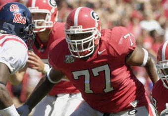 ATHENS, GA - SEPTEMBER 29: Tackle Trinton Sturdivant #77 of  the Georgia Bulldogs sets to block against the Mississippi Rebels at Sanford Stadium on September 29, 2007 in Athens, Georgia.  Georgia won 45 - 17. (Photo by Al Messerschmidt/Getty Images)