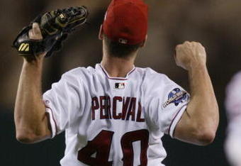 ANAHEIM, CA - OCTOBER 27:  Closing pitcher Troy Percival #40 of the Anaheim Angels celebrates the win at the end of World Series game seven against the San Francisco Giants at Edison Field in Anaheim, California on October 27, 2002.  The Angels won the title against the Giants on a 4-1 score, for the franchise's first championship in 42 years.  (Photo by Brian Bahr/Getty Images) 