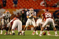 MIAMI - JANUARY 08:  Tim Tebow #15 of the Florida Gators awaits the snap in the shotgun formation against the Oklahoma Sooners during the FedEx BCS National Championship game at Dolphin Stadium on January 8, 2009 in Miami, Florida.  (Photo by Doug Benc/Getty Images)