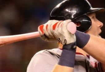 PHOENIX - MAY 10:  Adam Dunn #44 of the Washington Nationals hits a solo home run against the Arizona Diamondbacks during the third inning of the major league baseball game at Chase Field on May 10, 2009 in Phoenix, Arizona.  (Photo by Christian Petersen/Getty Images)