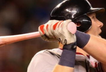 PHOENIX - MAY 10:  Adam Dunn #44 of the Washington Nationals hits a solo home run against the Arizona Diamondbacks during the third inning of the major league baseball game at Chase Field on May 10, 2009 in Phoenix, Arizona.  (Photo by Christian Petersen/Getty Images)