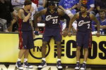 ORLANDO, FL - MAY 30: Delonte West #13, LeBron James #23 and Mo Williams #2 of the Cleveland Cavaliers sit on the sidelines preparing to take the court against the Orlando Magic in Game Six of the Eastern Conference Finals during the 2009 Playoffs at Amway Arena on May 30, 2009 in Orlando, Florida. NOTE TO USER: User expressly acknowledges and agrees that, by downloading and or using this photograph, User is consenting to the terms and conditions of the Getty Images License Agreement  (Photo by Doug Benc/Getty Images)