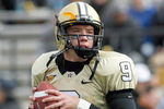NASHVILLE, TN - NOVEMBER 22:  Mackenzi Adams #9 of the Vanderbilt Commodores looks to pass the ball during the game of the Tennessee Volunteers at Vanderbilt Stadium on November 22, 2008 in Nashville, North Carolina.  (Photo by Kevin C. Cox/Getty Images)