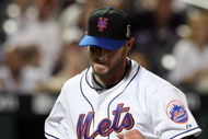 NEW YORK - AUGUST 20: Billy Wagner #13 of the New York Mets walks back to the dugout after the final out of the eighth inning against the Atlanta Braves on August 20, 2009 at Citi Field in the Flushing neighborhood of the Queens borough of New York City. (Photo by Jim McIsaac/Getty Images)