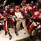 NEW ORLEANS - DECEMBER 21:  Members of the Troy Trojans prepare to take the field against the Southern Mississippi Golden Eagles during the R+L Carriers New Orleans Bowl on December 21, 2008 at the Superdome in New Orleans, Louisiana.  (Photo by Chris Graythen/Getty Images)