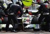 VALENCIA, SPAIN - AUGUST 23:  Jenson Button of Great Britain and Brawn GP drives in for a pitstop during the European Formula One Grand Prix at the Valencia Street Circuit on August 23, 2009, in Valencia, Spain.  (Photo by Mark Thompson/Getty Images)