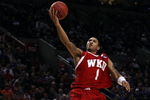 PORTLAND, OR - MARCH 21:  Sergio Kerusch #1 of the Western Kentucky Hilltoppers goes up for a layup as Demetri Goodson #3 of the Gonzaga Bulldogs looks on during the second round of the NCAA Division I Men's Basketball Tournament at the Rose Garden on March 21, 2009 in Portland, Oregon.  (Photo by Jonathan Ferrey/Getty Images)