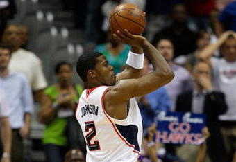 ATLANTA - MAY 11:  Joe Johnson #2 of the Atlanta Hawks shoots against the Cleveland Cavaliers during Game Four of the Eastern Conference Semifinals during the 2009 NBA Playoffs at Philips Arena on May 11, 2009 in Atlanta, Georgia.  NOTE TO USER: User expressly acknowledges and agrees that, by downloading and/or using this Photograph, user is consenting to the terms and conditions of the Getty Images License Agreement.  (Photo by Andy Lyons/Getty Images)