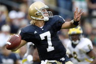 SOUTH BEND, IN - SEPTEMBER 13:  Jimmy Clausen #7 of the Notre Dame Fighting Irish throws a first quarter pass while playing the Michigan Wolverines on September 13, 2008 at Notre Dame Stadium in South Bend, Indiana. Notre Dame won the game 35-17.  (Photo by Gregory Shamus/Getty Images)