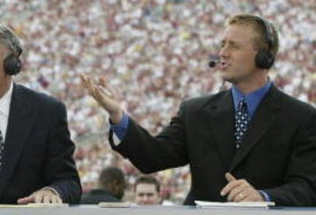 TALLAHASSEE, FL - OCTOBER 26:  ESPN College GameDay announcers (l to r) Chris Fowler, Lee Corso and Kirk Herbstreit comment during the NCAA football game between Notre Dame and Florida State at Doak Campbell Stadium on October 26, 2002 in Tallahassee, Florida.  The Notre Dame Fighting Irish defeated the Florida State Seminoles 34-24.  (Photo by Craig Jones/Getty Images)