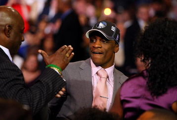 NEW YORK - JUNE 25:  Sixth overall draft pick by the Minnesota Timberwolves,  Jonny Flynn is congratulated by members of his entourage during the 2009 NBA Draft at the Wamu Theatre at Madison Square Garden June 25, 2009 in New York City. NOTE TO USER: User expressly acknowledges and agrees that, by downloading and/or using this Photograph, User is consenting to the terms and conditions of the Getty Images License Agreement.  (Photo by Jim McIsaac/Getty Images)