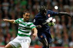 GLASGOW, SCOTLAND - AUGUST 18:  Shaun Maloney of Celtic goes up for the ball against Bacary Sagna of Arsenal during a UEFA Champions League Qualifying match between Celtic and Arsenal at Celtic Park on August 18, 2009 in Glasgow, Scotland.  (Photo by Phil Cole/Getty Images)